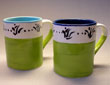 Floral band mugs in light kiwi, turquoise and federal blue