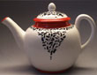 Neon red filigree teapot