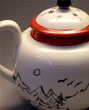 Detail sun side of Inkwash Moon teapot