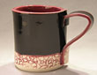 Betty Ware mug black and red $35